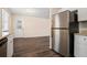 Stainless steel refrigerator in a kitchen with granite countertops at 459 Oak Se Dr, Atlanta, GA 30354