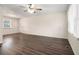 Spacious living room featuring hardwood floors and a ceiling fan at 459 Oak Se Dr, Atlanta, GA 30354