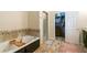 Bathroom with soaking tub, shower, and spacious closet at 5274 Monarch Pine Ln, Peachtree Corners, GA 30071