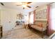 Well-lit Bedroom with gold crib and pink accents at 5274 Monarch Pine Ln, Peachtree Corners, GA 30071