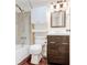 Bathroom with shower/tub combo and wood vanity at 620 Peachtree Ne St # 415, Atlanta, GA 30308