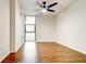 Bright bedroom with hardwood floors and ceiling fan at 620 Peachtree Ne St # 415, Atlanta, GA 30308