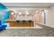 Stylish common area with a bar and modern wall art at 620 Peachtree Ne St # 415, Atlanta, GA 30308