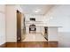 Modern kitchen with stainless steel appliances and white cabinets at 620 Peachtree Ne St # 415, Atlanta, GA 30308