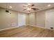 Finished basement with ceiling fan, recessed lighting, and extra storage at 6204 Woodlore Nw Dr, Acworth, GA 30101