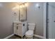 Basement bathroom with vanity, toilet and shower at 6204 Woodlore Nw Dr, Acworth, GA 30101