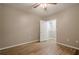 Spacious bedroom with wood-look flooring and ample closet space at 6204 Woodlore Nw Dr, Acworth, GA 30101