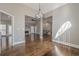 Open dining room with hardwood floors and view of living room at 6204 Woodlore Nw Dr, Acworth, GA 30101