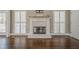 White brick fireplace with mantel in living room at 6204 Woodlore Nw Dr, Acworth, GA 30101