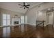 Living room with hardwood floors, fireplace, and high ceilings at 6204 Woodlore Nw Dr, Acworth, GA 30101