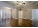 Spacious main bedroom with hardwood floors, ceiling fan and ample natural light at 6204 Woodlore Nw Dr, Acworth, GA 30101