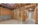 Unfinished basement with exposed framing and potential for customization at 1410 Metropolitan Sw Pkwy, Atlanta, GA 30310