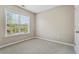 Well-lit bedroom with a window and neutral decor at 1410 Metropolitan Sw Pkwy, Atlanta, GA 30310