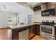 Modern kitchen with stainless steel appliances and granite countertops at 1410 Metropolitan Sw Pkwy, Atlanta, GA 30310