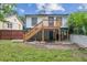 Back of house with deck, stairs, and fenced yard at 1036 Donnelly Sw Ave, Atlanta, GA 30310