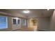 Spacious finished basement with recessed lighting and tile floors at 106 Ashwood N Ct, Stockbridge, GA 30281