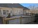 Spacious wooden deck overlooks private backyard at 106 Ashwood N Ct, Stockbridge, GA 30281