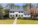 Beautiful white house with black accents and landscaping at 3220 Farmington Se Dr, Atlanta, GA 30339