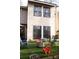 Backyard patio with artificial turf, fire pit, and seating at 4846 Twin Lakes Trl, Atlanta, GA 30360