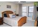 Bright bedroom with double bed and large windows at 4846 Twin Lakes Trl, Atlanta, GA 30360