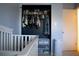 Well-organized Bedroom closet with ample hanging space and shelving at 4846 Twin Lakes Trl, Atlanta, GA 30360