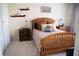 Bright bedroom with wood bed frame, nightstands, and ample natural light at 4846 Twin Lakes Trl, Atlanta, GA 30360