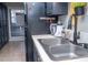 Modern kitchen features a double sink, updated countertops, and ample cabinet space at 4846 Twin Lakes Trl, Atlanta, GA 30360