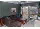 Spacious living room with large windows, hardwood floors, and comfortable seating at 4846 Twin Lakes Trl, Atlanta, GA 30360