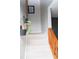 Stairs with carpeted steps and wooden railing leading to the upper level at 4846 Twin Lakes Trl, Atlanta, GA 30360