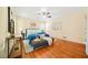 Bright bedroom with hardwood floors and ceiling fan at 719 Lynn Valley Sw Rd, Atlanta, GA 30311
