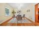 Charming dining room with hardwood floors and a chandelier at 719 Lynn Valley Sw Rd, Atlanta, GA 30311