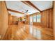 Open Gathering room with hardwood floors and kitchen access at 719 Lynn Valley Sw Rd, Atlanta, GA 30311