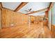 Spacious Gathering room featuring hardwood floors and exposed beams at 719 Lynn Valley Sw Rd, Atlanta, GA 30311
