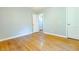 Hardwood floors and neutral walls in this bedroom at 145 Holly Nw Rd, Atlanta, GA 30314