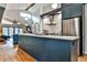 Updated kitchen, featuring stainless steel appliances and a herringbone backsplash at 3063 Leafwood Dr, Decatur, GA 30033