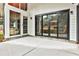 Spacious patio with modern sliding doors and concrete flooring at 3063 Leafwood Dr, Decatur, GA 30033