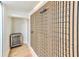 Modern wine cellar with metal and wood racking system at 3365 Turtle Lake Se Dr, Marietta, GA 30067