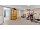 Partially finished basement with gym at 66 Trevor Way, Temple, GA 30179