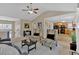 Open concept living room with views into the kitchen and upper level at 66 Trevor Way, Temple, GA 30179
