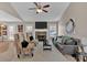 Spacious living room featuring a fireplace and access to the kitchen at 66 Trevor Way, Temple, GA 30179