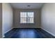 Spacious bedroom with large window and tile floors at 962 Pierce Ivy Ct, Lawrenceville, GA 30043