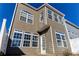 Exterior view of the home showcasing its design at 962 Pierce Ivy Ct, Lawrenceville, GA 30043