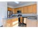 Modern kitchen with stainless steel appliances and an island at 962 Pierce Ivy Ct, Lawrenceville, GA 30043