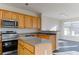Spacious kitchen featuring stainless steel appliances at 962 Pierce Ivy Ct, Lawrenceville, GA 30043