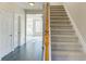 Carpeted staircase leading to the upper level at 962 Pierce Ivy Ct, Lawrenceville, GA 30043