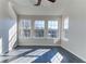 Sunroom features tile flooring and multiple windows at 962 Pierce Ivy Ct, Lawrenceville, GA 30043