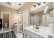 Bathroom features double vanity, soaking tub, and walk-in shower at 1772 Benningfield Dr, Marietta, GA 30064