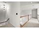 Upstairs hallway with carpet and neutral paint at 1772 Benningfield Dr, Marietta, GA 30064