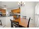 Kitchen with breakfast area and wood cabinets at 1772 Benningfield Dr, Marietta, GA 30064