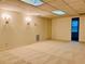 Finished basement room with carpeted floor and recessed lighting at 4817 Carlene Sw Way, Lilburn, GA 30047